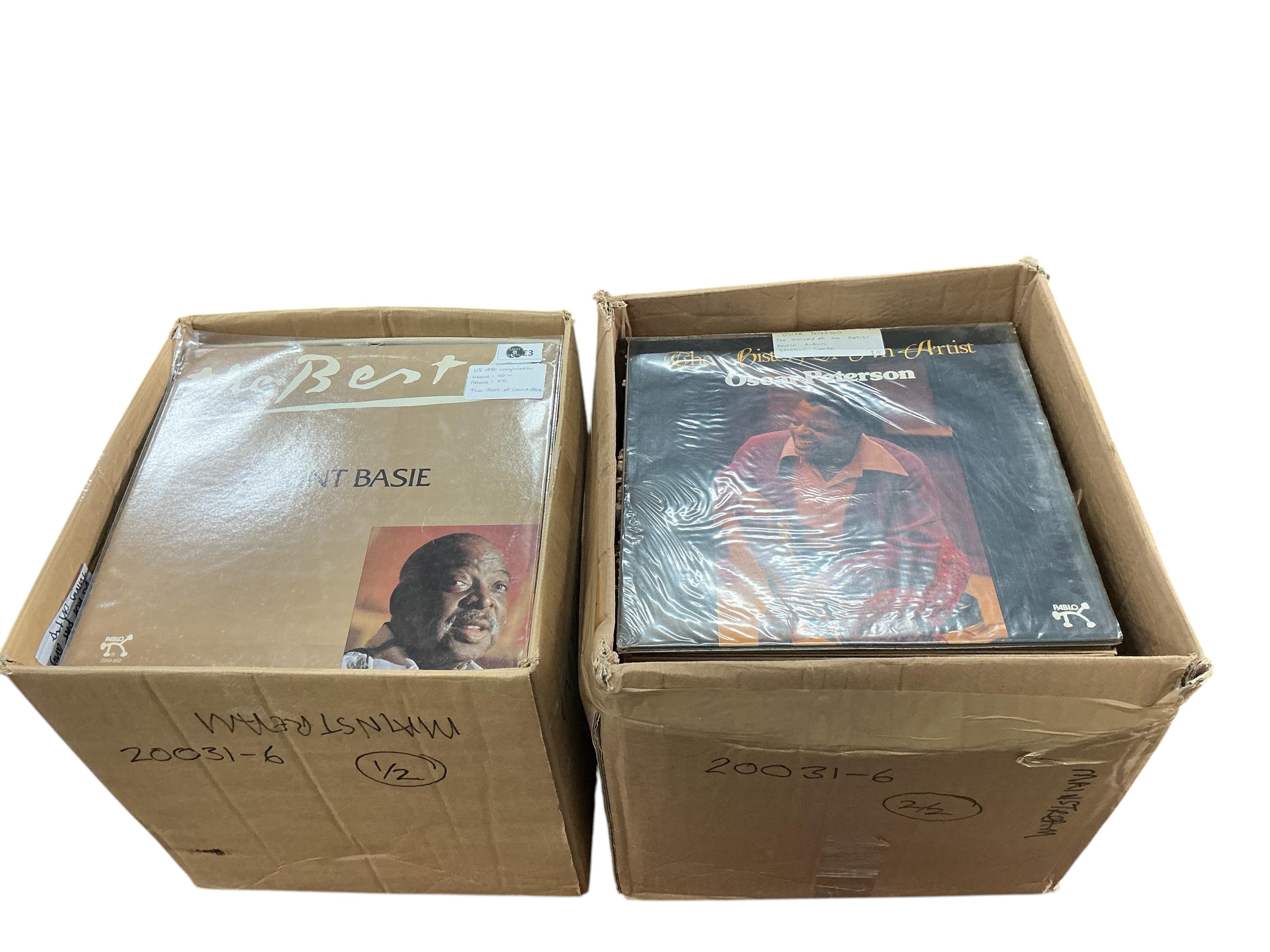 Two boxes of jazz LP record albums, artist including; Count Basie, Duke Ellington, Paul Desmond, Bessie Smith, June Christy, Oscar Peterson, Frank Sinatra, Billie Holiday, etc.
